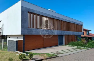 Casa em condomínio fechado com 6 quartos à venda no rio tavares, florianópolis , 580 m2 por r$ 7.900.000