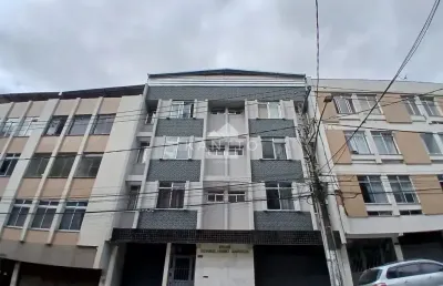 Apartamento três quartos com garagem, fundos com vista
