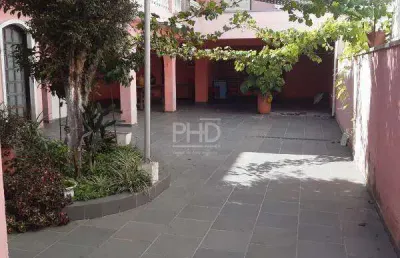 Casa com 8 vagas de garagens - região central baeta neves