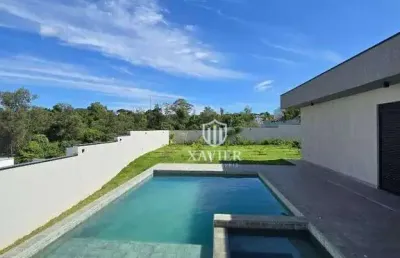 Casa térrea à venda no condomínio fazenda jequitibá – 3 suítes, piscina e integração com a natureza