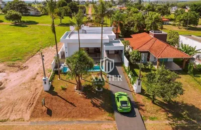 Casa térrea  mobiliada à venda no condomínio ninho verde ii – piscina, acabamento premium e permuta por carro