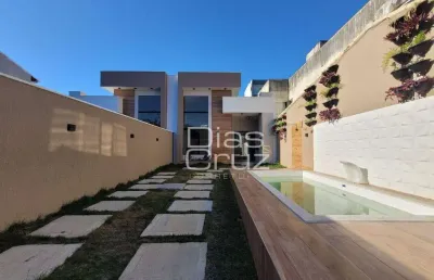 Casa linear de alto padrão de 3 quartos com pé direito duplo no recreio em rio das ostras!!