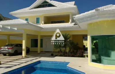 Belíssima casa triplex no melhor condomínio da ilha de guaratiba