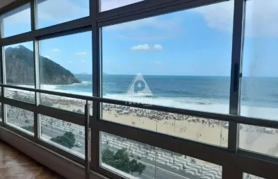 Apartamento localizado no leme, com quatro suítes, duas vagas de garagem