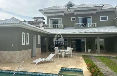 Casa em condomínio fechado com 5 suítes no interlagos de itaúna