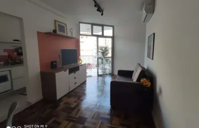 Apartamento quarto e sala com varanda e vaga escritura no coração de bairro botafogo