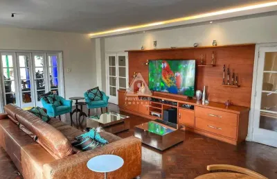 Apartamento composto por 3 salas, 4 quartos com 2 suites de frente com vaga no flamengo