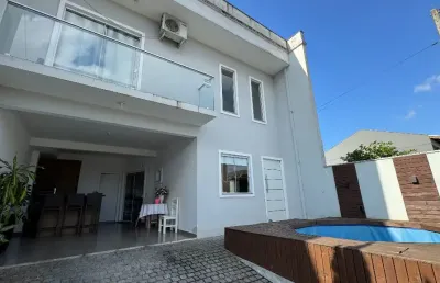 Sobrado geminado com 1 suíte com closet mais 1 quarto à venda no bairro  floresta