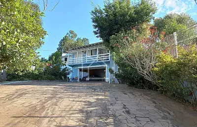 Casa com 4 quartos à venda na avenida joão carlos viale dias, tarumã, viamão, 333 m2 por r$ 2.110.000