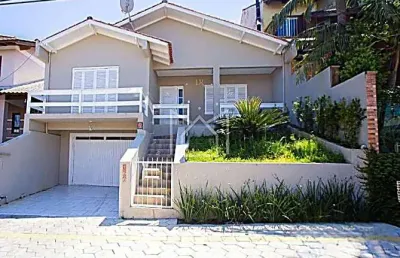 Casa em condomínio fechado com 3 quartos à venda na rua sol nascente, 166, loteamento jardim timbaúva, gravataí, 170 m2 por r$ 560.000