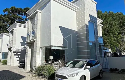 Casa em condomínio fechado com 3 quartos à venda na rua vinte e oito, parque das hortênsias, canela, 141 m2 por r$ 960.000