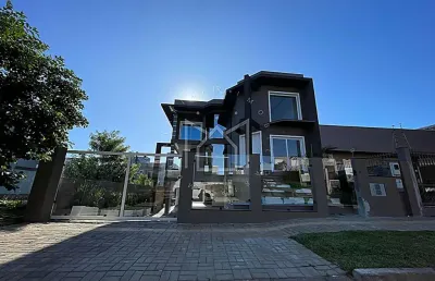 Casa em condomínio fechado com 4 quartos à venda na rua do butiá, 27, reserva do arvoredo, gravataí, 215 m2 por r$ 999.000