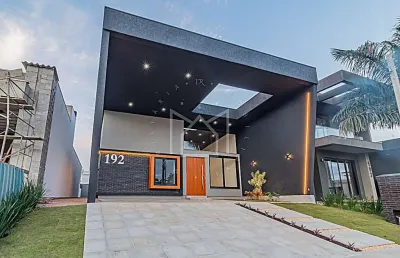 Casa em condomínio fechado com 3 quartos à venda na rua adolfo inácio de barcelos, 1490, centro, gravataí, 173 m2 por r$ 1.395.000