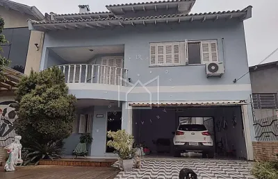 Casa com 5 quartos à venda na rua vinte de setembro, barnabé, gravataí, 258 m2 por r$ 1.300.000