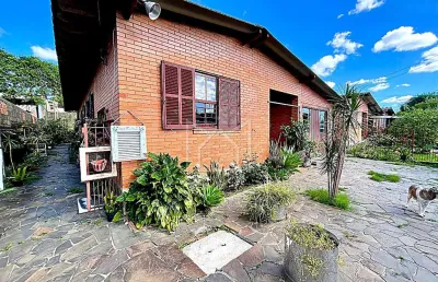 Casa com 3 quartos à venda na rua flávio barros, 111, bom sucesso, gravataí, 150 m2 por r$ 450.000