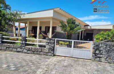 Imóvel em área mista pé na areia em jardim suarão .