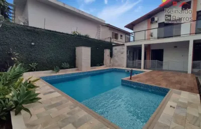Sobrado com 4 dormitórios e piscina à venda, por r$ 870.000 - suarão - itanhaém/sp