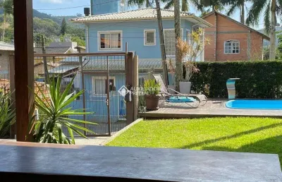 Casa com 3 quartos à venda na condomínio canto da lagoa, 323, lagoa da conceição, florianópolis, 180 m2 por r$ 1.800.000
