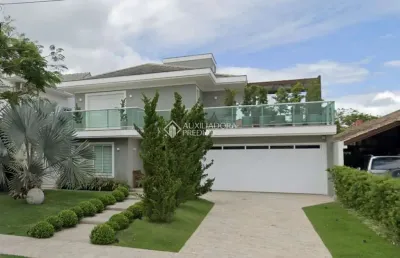 Casa com 4 quartos à venda na avenida dos dourados, 450, jurerê internacional, florianópolis, 220 m2 por r$ 5.269.000