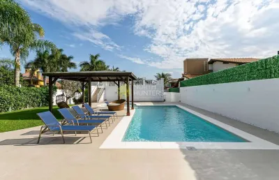 Casa com 4 dormitórios para alugar, 250 m² por r$ 8.750,00/dia - jurerê internacional - florianópol