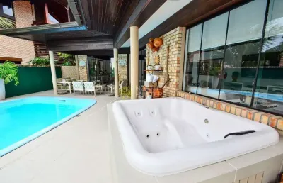 Casa com 7 dormitórios, piscina e ofurô para alugar, por r$ 7.100/dia - jurerê internacional - flor