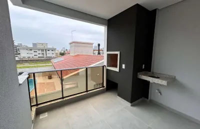 Apartamento 02 suítes próximo ao mar no la linda residence  na praia de palmas em governador celso ramos - santa catarina.