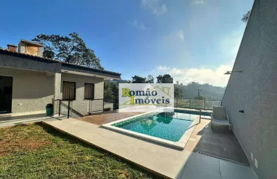 Terreno com 2 lindas casas com excelente acabamento e área gourmet com piscinas e churrasqueiras, excelente opção de imóvel para sua familia.