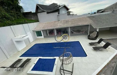 Sobrado com 4 dormitórios à venda, 550 m² por r$ 4.850.000,00 - caputera - arujá/sp