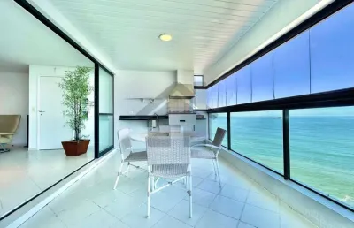 Apartamento vista mar à venda na pitangueiras no guarujá | qvista inteligência imobiliária guarujá