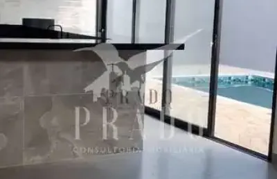 Casa térrea com piscina em condomínio em atibaia-sp