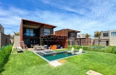 Casa 302m², em condomínio, pé na areia, 5 suites porteira fechada, piscina aquecida c/  jacuzzi,  4 vagas