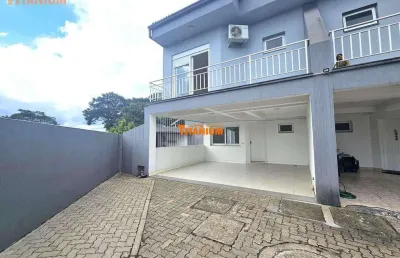 Casa à venda em condomínio no bairro rondônia em novo hamburgo