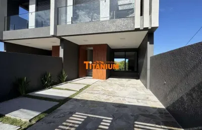Casa à venda com 3 dormitórios, sendo 1 suíte, lareira, churrasqueira, no bairro rincão em novo hamburgo.