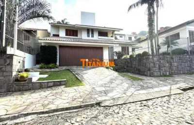 Casa semimobiliada, com 4 dormitórios, sendo 1 suíte master, à venda no bairro guarani em novo hamburgo