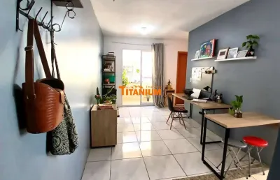 Apartamento à venda com 2 dormitórios, semimobiliado, sacada com churrasqueira, local plano, com garagem, no bairro vila rosa em novo hamburgo.