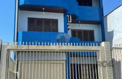 Casa 420m², 4 dormitórios, 3 vagas no bairro partenon