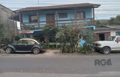 Casa com 3 quartos, vaga de garagem, churrasqueira, no bairro partenon, porto al