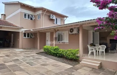 Casa com 3 quartos à venda na Rua César de Castro, 163, Teresópolis, Porto Alegre