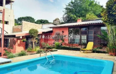 Casa com 6 quartos à venda na Avenida Arnaldo Bohrer, 171, Teresópolis, Porto Alegre