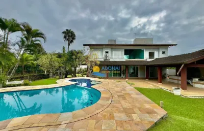 Casa à venda na praia do pernambuco, 5 suítes, 4 vagas.