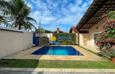 Enseada casa com 5 quartos sendo 3 suites com piscina e churrasqueira.
