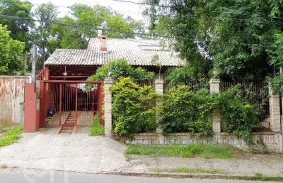Casa com 5 quartos à venda na avenida heitor vieira, 794, belém novo, porto alegre, 132 m2 por r$ 700.000