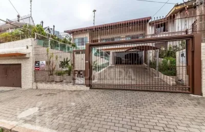 Casa com 3 quartos à venda na rua senador annibal di primio beck, 161, boa vista, porto alegre, 490 m2 por r$ 2.000.000