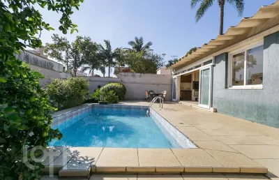 Casa com 4 quartos à venda na rua alfredo schuett, 833, três figueiras, porto alegre, 348 m2 por r$ 1.800.000