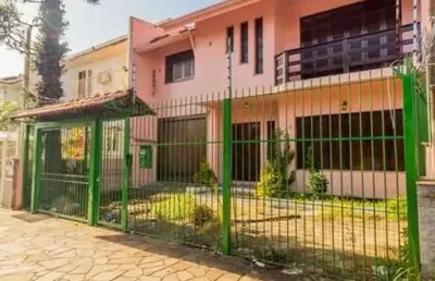 Casa com 5 quartos à venda na rua monteiro lobato, 395, partenon, porto alegre, 381 m2 por r$ 1.600.000