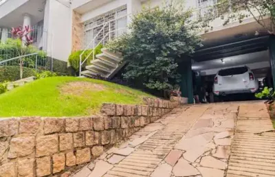 Casa com 3 quartos à venda na rua gustavo schmidt, 332, três figueiras, porto alegre, 227 m2 por r$ 1.275.000