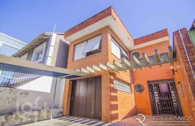 Casa com 4 quartos à venda na rua eudoro berlink, 482, auxiliadora, porto alegre, 214 m2 por r$ 1.700.000