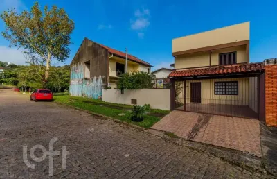Casa com 2 quartos à venda na rua ari peixoto martins, 51, espírito santo, porto alegre, 128 m2 por r$ 480.000