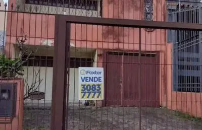 Casa com 5 quartos à venda na rua casemiro de abreu, 944, rio branco, porto alegre, 125 m2 por r$ 1.300.000