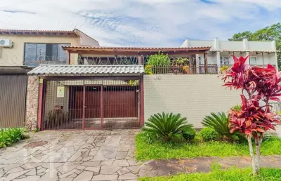 Casa com 4 quartos à venda na rua lloyd de andrade polidoro, 45, ipanema, porto alegre, 237 m2 por r$ 803.225